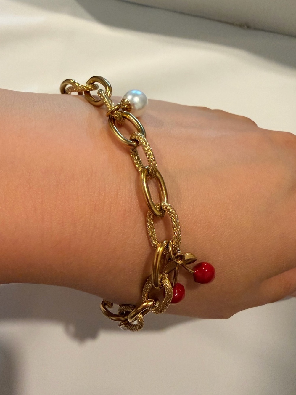 Gold Charm Bracelet with Red and White Accents - Picture 6 of 9